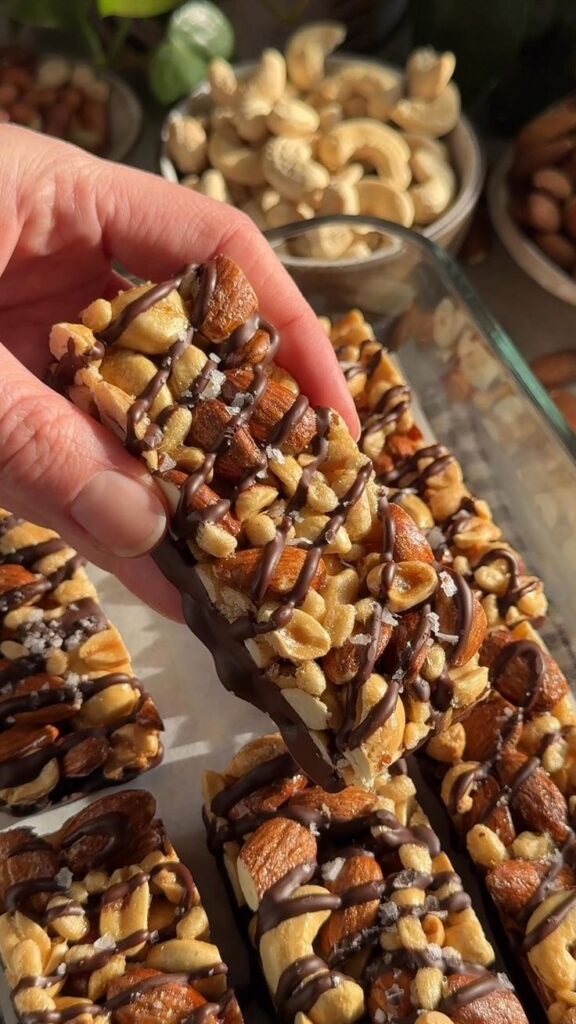 Homemade mixed nuts snack with almonds walnuts pistachios and dried fruit